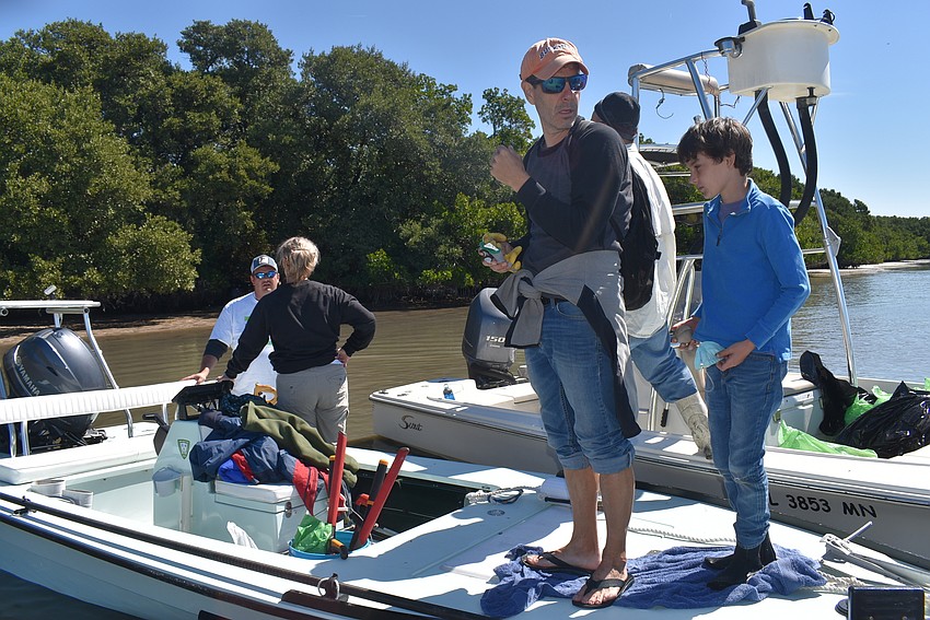 Volunteers head back to Longboat Key.