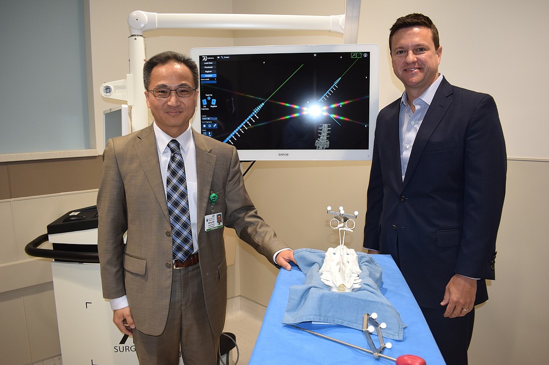 Dr. Huan Wang and 7D Surgical Vice President Scott Young talk about the new Machine-Vision Image Guided Surgery Platform.