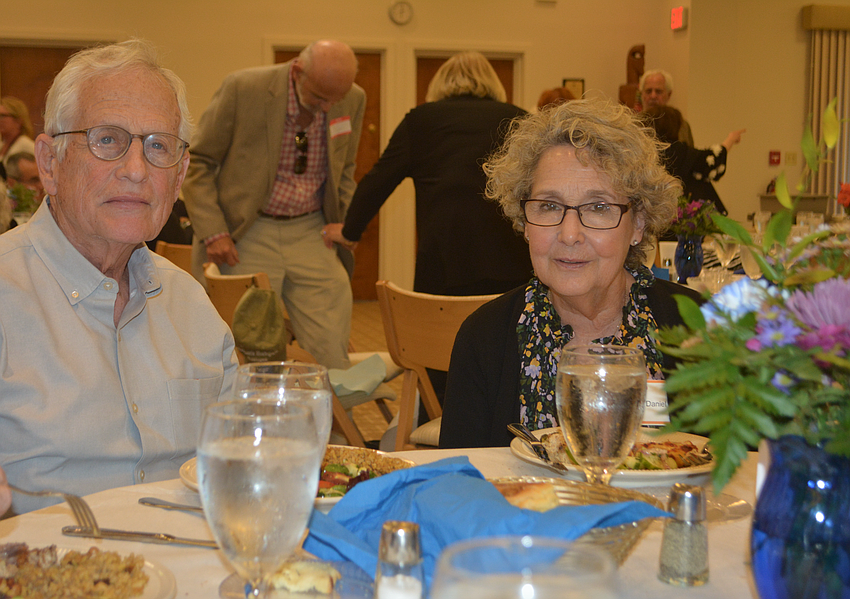 Miriam Daniel (right), the daughter of late Longboaters and Beit Daniel Synagogue founders Ruth and Gerald Daniel, poses with her husband, Larry Wolff, during shabbat dinner Friday night at Temple Beth Israel.