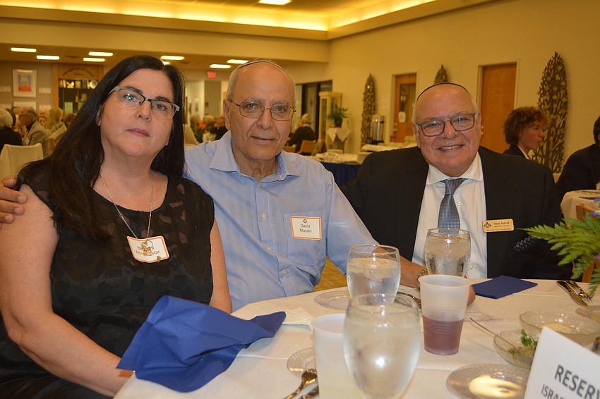 (Left to right) Barbara Morningstar, David Mizrahi and Temple Beth Israel executive director Isaac Azaerad pose during shabbat dinner Friday night at the inaugural Israel Weekend at TBI.
