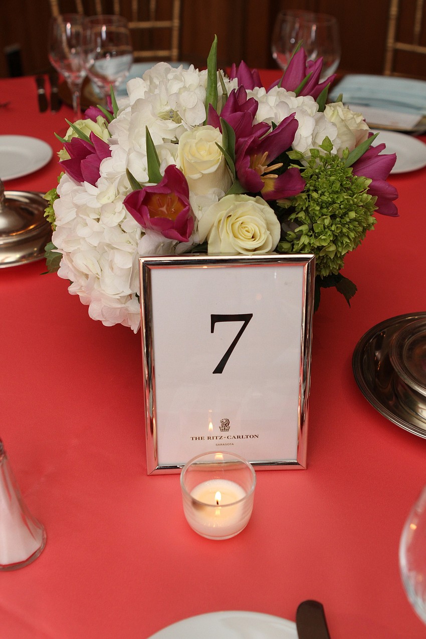 Flowers and other decor lined the tables.