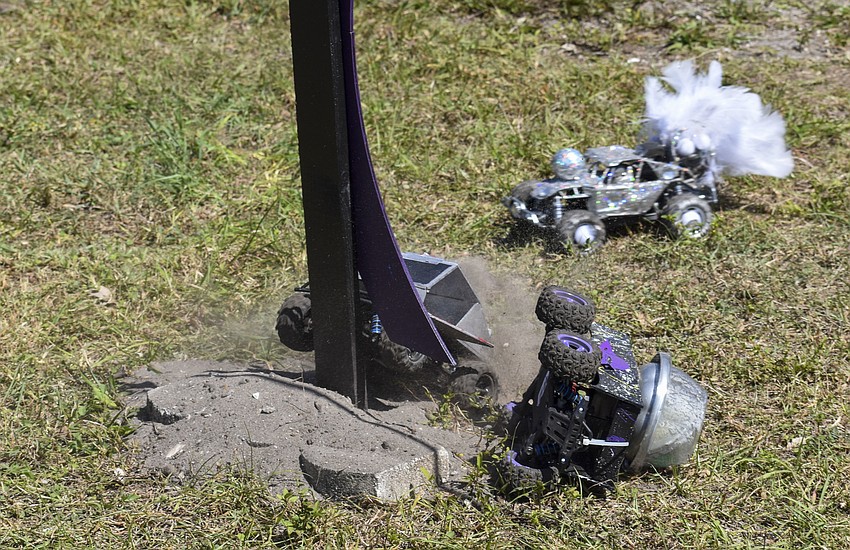 During the Grand Champion race two of the cars bump into each other.