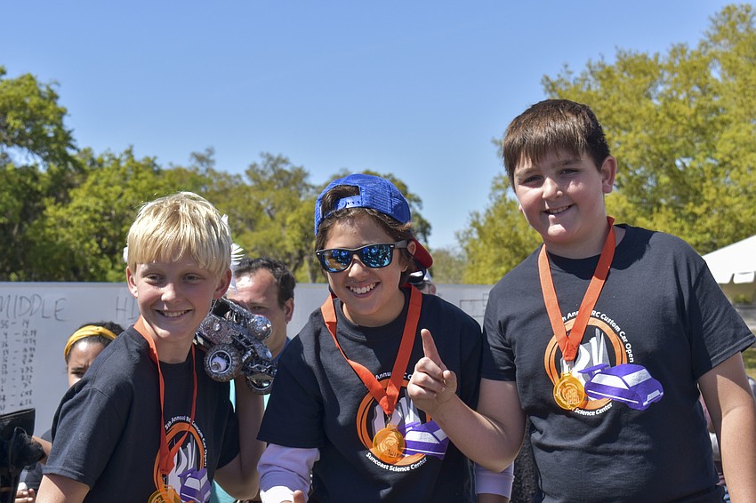 Charlie Rasool, 11, Max Ruzek, 11, and Chase Evanoff, 11