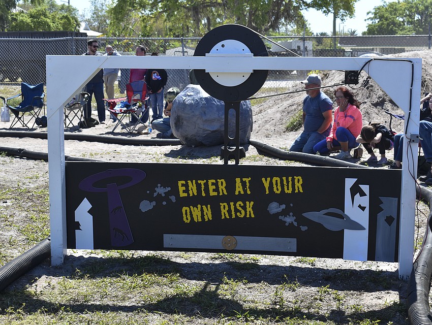 The course features a slowly closing door that the drivers had to drive under.