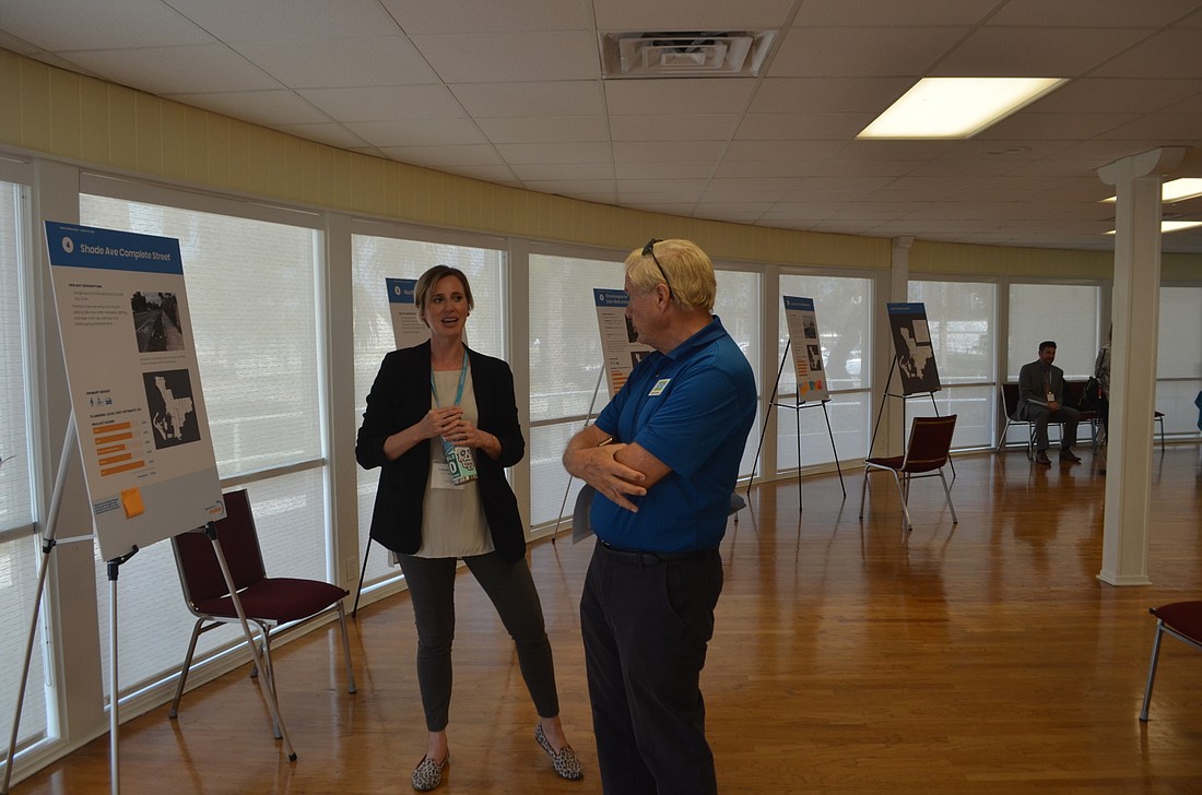 Chief Transportation Planner Colleen McGue discusses the Sarasota in Motion master plan with resident Patrick Gannon at a workshop Tuesday, March 10.