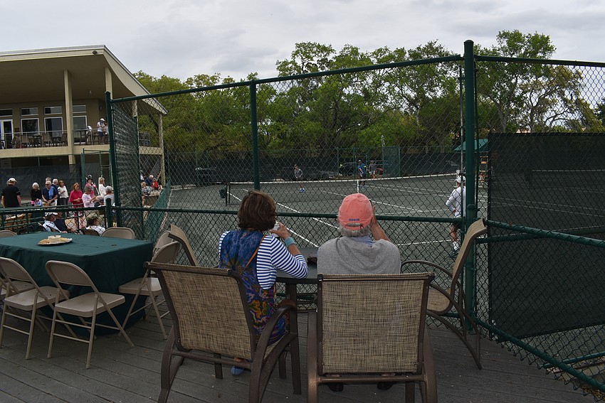 Attendees lined up on the edges of the courts to watch.