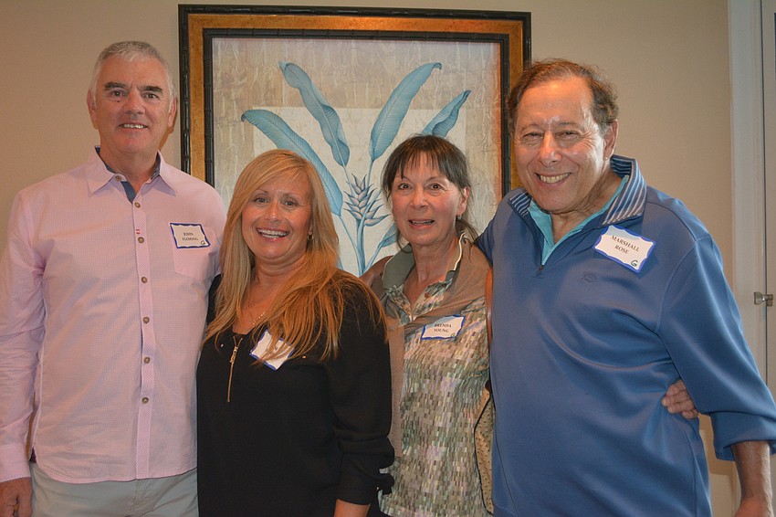 (Left to right) John Fleming, Kim Barri (representing her husband, Jim Barri), Brenda Young and Marshall Rose won the 15th annual Beachplace Golf Tournament with a 5-under 66.