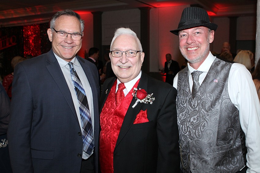 Joseph Holt, honorary chair John Fischer and Brent Greeno