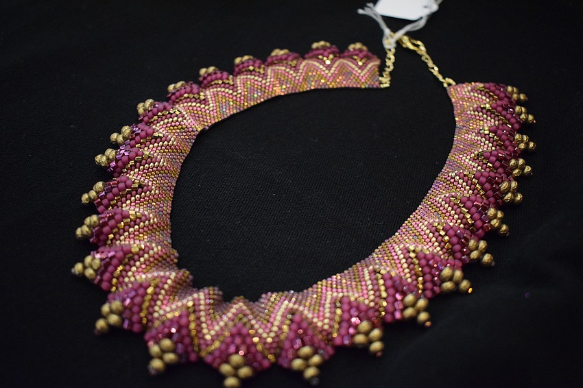 This necklace is artist Elaine Vaughn's favorite piece in her collection. She says it took three weeks to make as every bead was put on using a needle and thread.