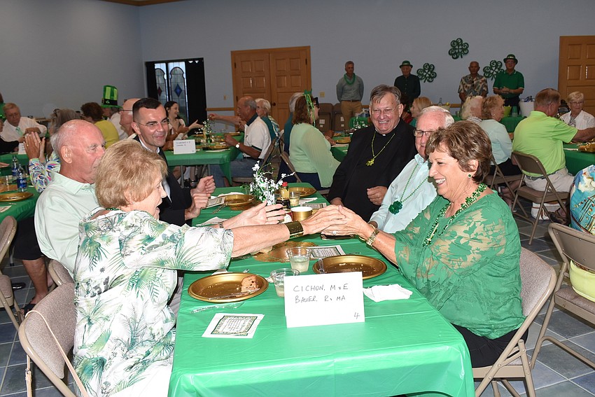 Attendees played pass the potato at their tables.