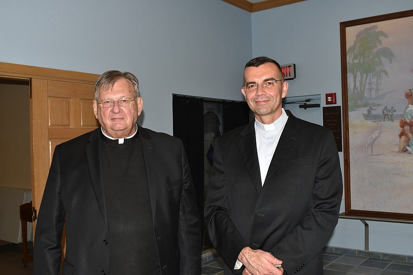 Father Phil Schweda and the church's new pastor, Father Robert Dziedziak