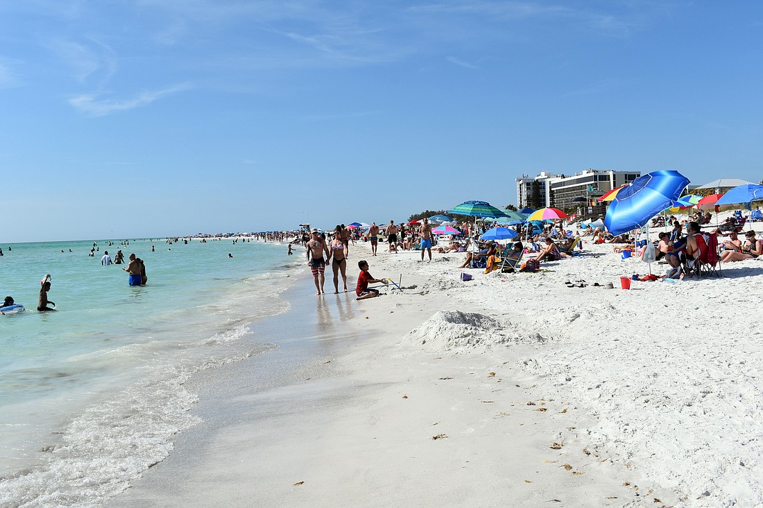 Thousands visited Lido Beach on Sunday.