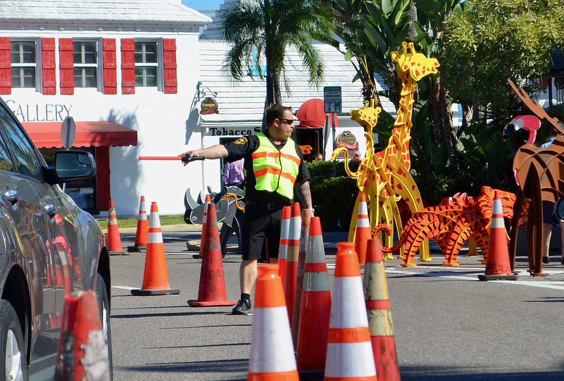 Crossing guards were employed earlier this year during an art show in St. Armands Circle.