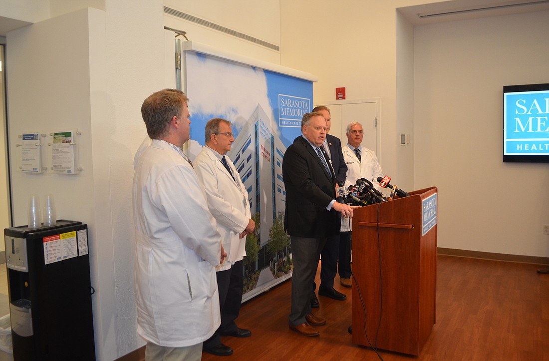 Sarasota Memorial Hospital President and CEO David Verinder speaks at a March 3 press conference about the local COVID-19 response. Since then, six patients at the hospital have tested positive for the disease.