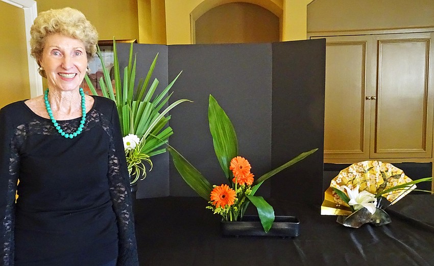 Polly Curran alongside her demonstrations. Photo courtesy of Barbara Jendrysik