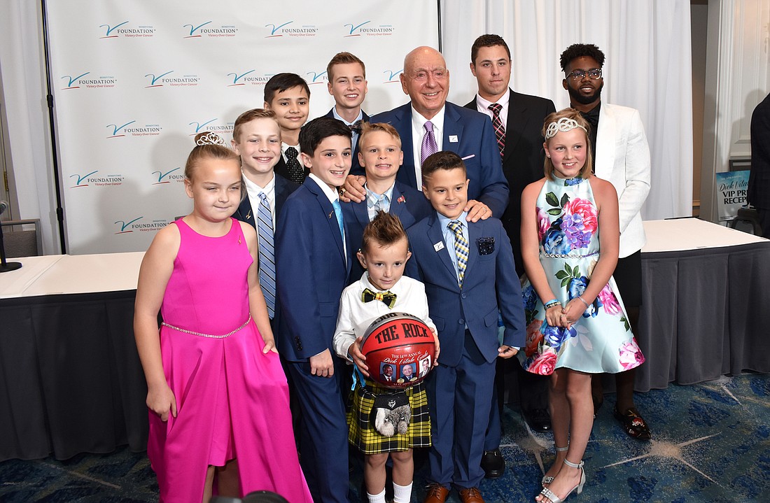 Dick Vitale said he has been sanitizing his hands too many times to count while social distancing. Here, Vitale stands with his "All-Courageous Team" at the 2019 Dick Vitale Gala.