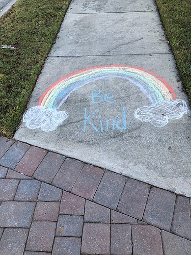 Being kind can mean painting a rainbow, such as this one on a sidewalk in Greenbrook, to make people smile. Courtesy photo