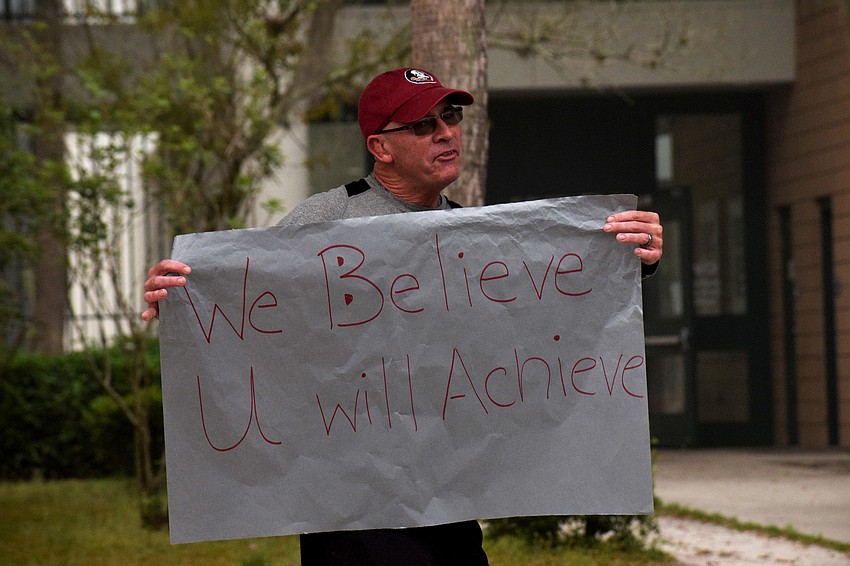 John Wolfe, a U.S. history teacher at Braden River Middle School, encourages students before they start online learning.