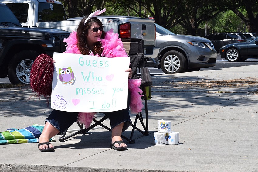 When first grade teacher Tammy Peters' students came by in their cars, Peters' gave them toilet paper.