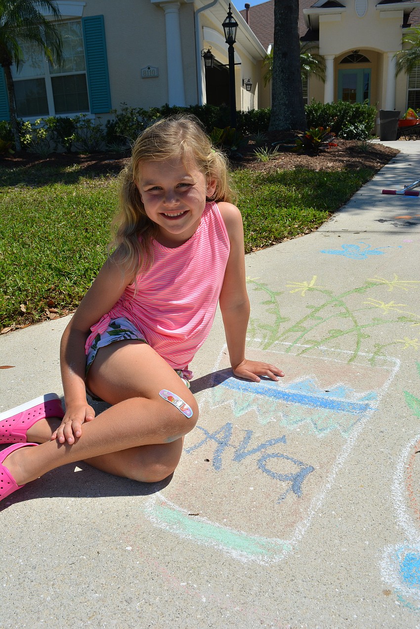 Six-year-old Ava Gilbank colored in the vase and flowers her mother, Kristen Gilbank, drew.