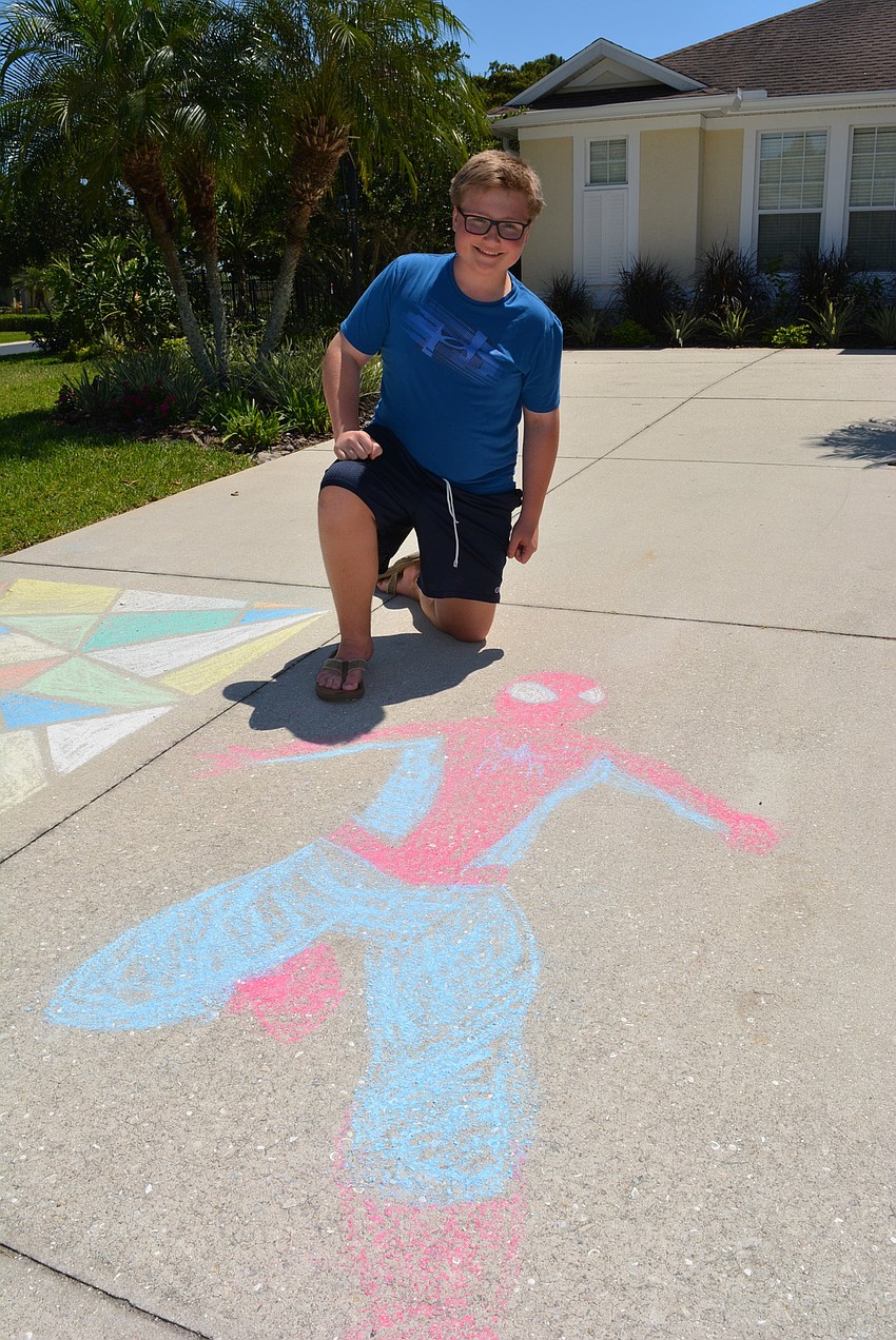 Fifteen-year-old Ryan Fenton's Spiderman character was the talk of the neighborhood. A sparkle in the driveway material gave it a shimmery appearance.