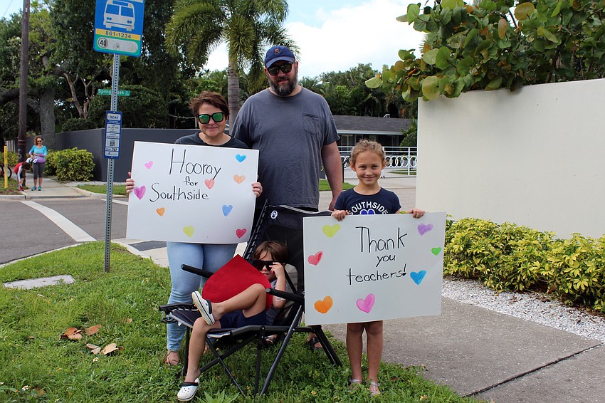 The Howell family waits for the parade.
