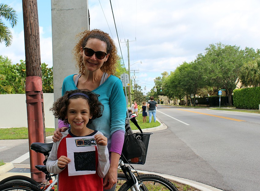 Amy and Logan Schwartz rode their bikes to the parade.