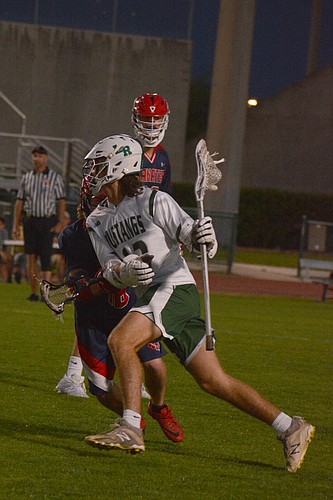 Lakewood Ranch High boys lacrosse senior Owen Ingham, here driving the lane against Manatee High in 2019, has been a leader for the Mustangs during the pandemic.