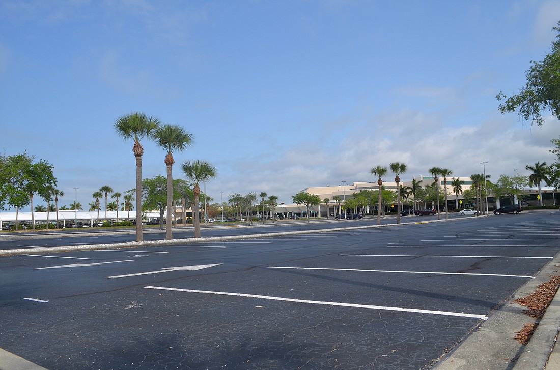 Most of the parking lot at Sarasota Bradenton International Airport sits empty during what airport officials hoped could be a record-setting month for traffic.