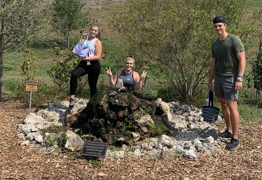 Brooklyn Lucero and Taylor Woodring, both seniors at Lakewood Ranch High, join Brookyn's brother, Bryson, for an Easter egg hunt at the Celery Fields. Bryson Lucero is a quarterback at the University of Alabama Birmingham.