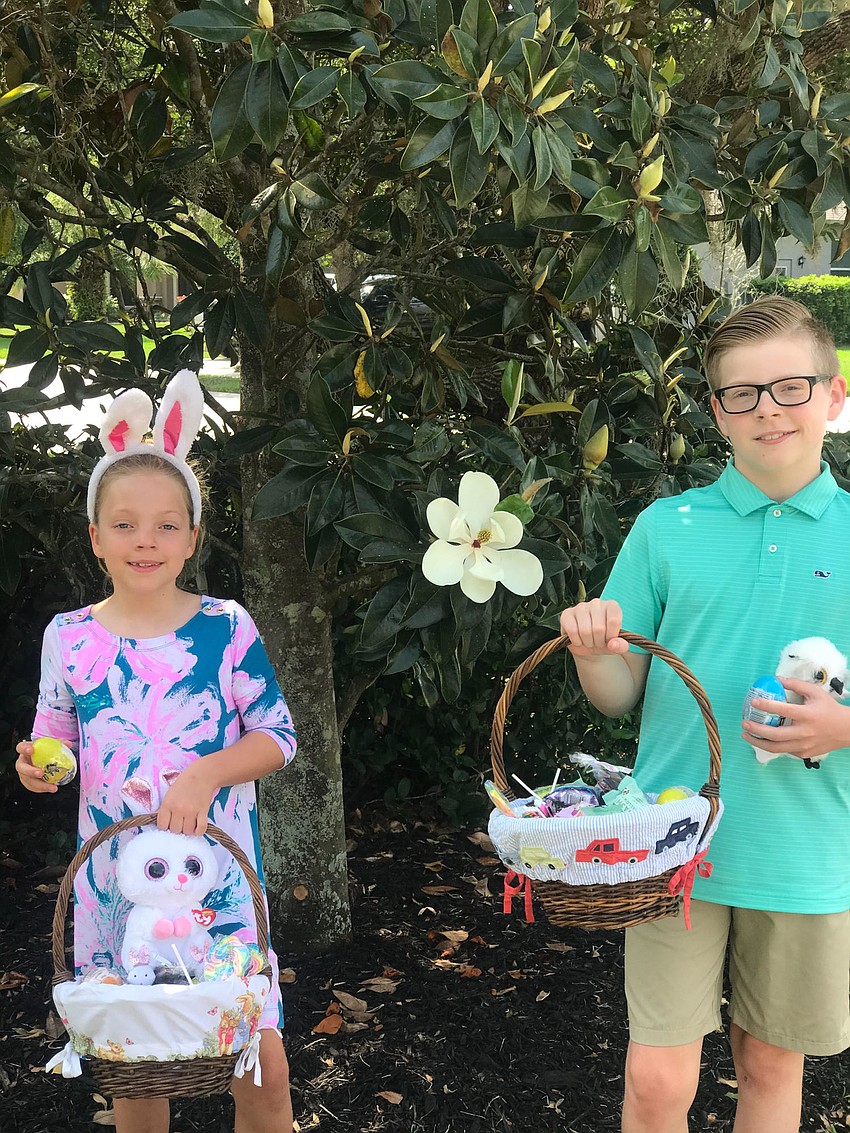 Kylie and Kayden West of Mill Creek show off their Easter bounty.
