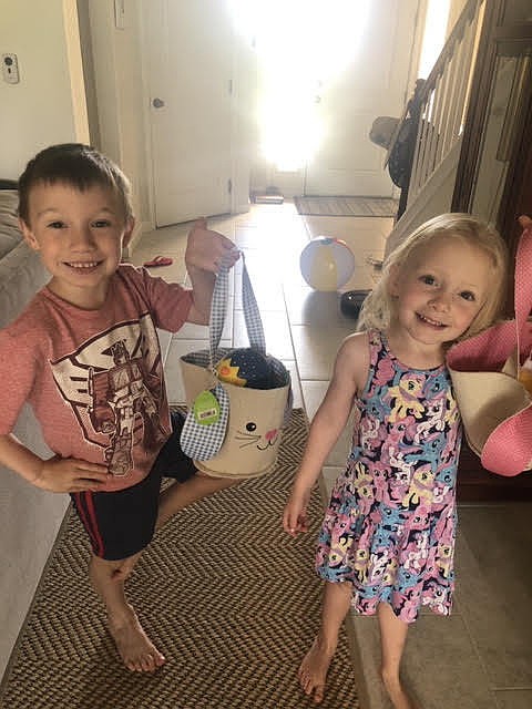 Harmony's Penn and Kearney Reynolds are overjoyed by what the Easter bunny left in their yard.