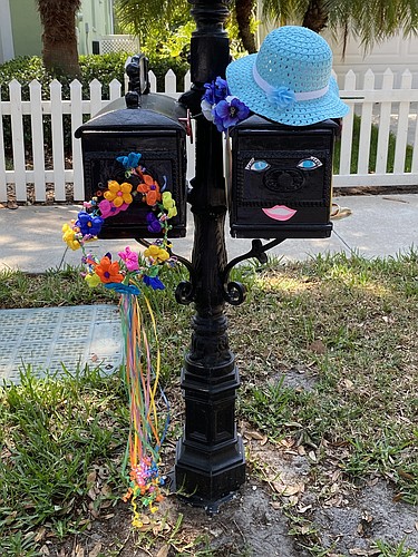 Some of the Meadow Sweet Circle mailboxes featured faces to go with an Easter bonnet. Photo courtesy Deb Holton-Smith.