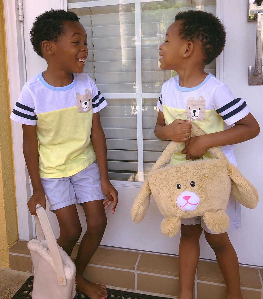 East County's Tristian Hillman and Manny Hillman are loving Easter morning as they get ready for an egg hunt.