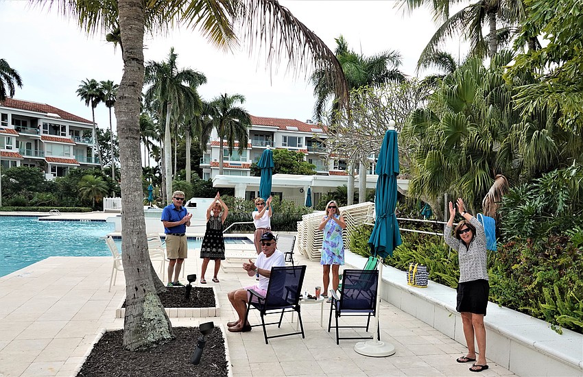 A group at the pool joined in the clapping. Photo courtesy of Susan Goodfriend.