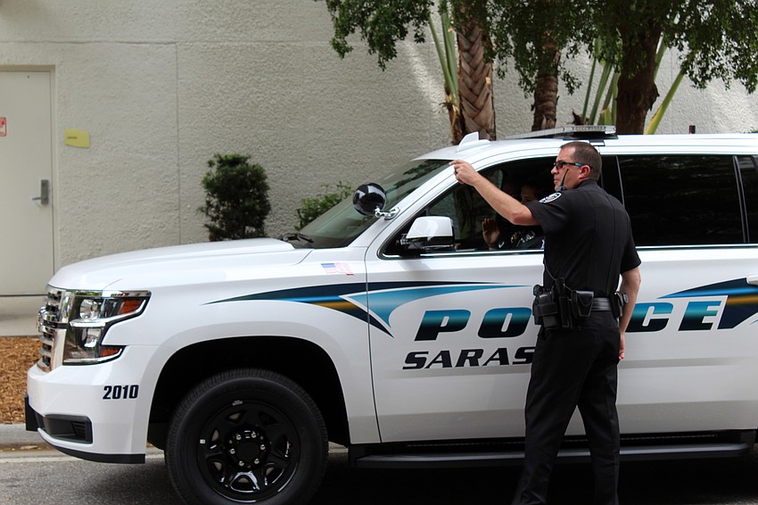 Sarasota Police officers line up in front of the hospital. Brynn Mechem