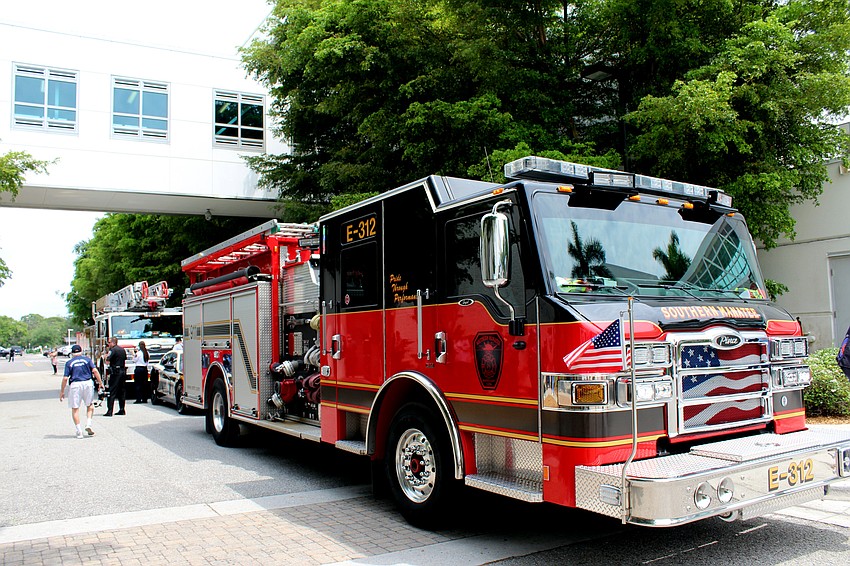 Four fire trucks line up at Sarasota Memorial Hospital. Brynn Mechem