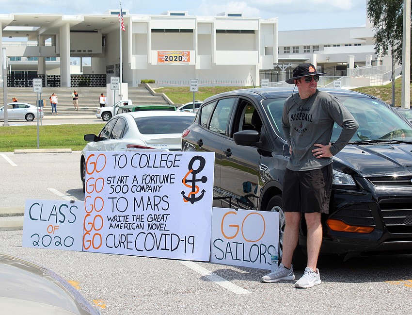 Many teachers decorated their cars with inspirational signs.