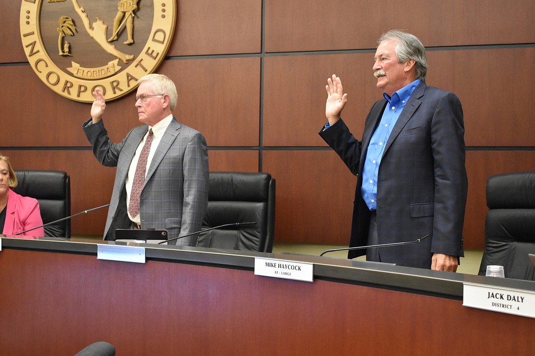 Mayor Ken Schneier (left) and Vice Mayor Mike Haycock (right) were sworn in to their respective positions on March 23, which is the last time the town commission met in person.