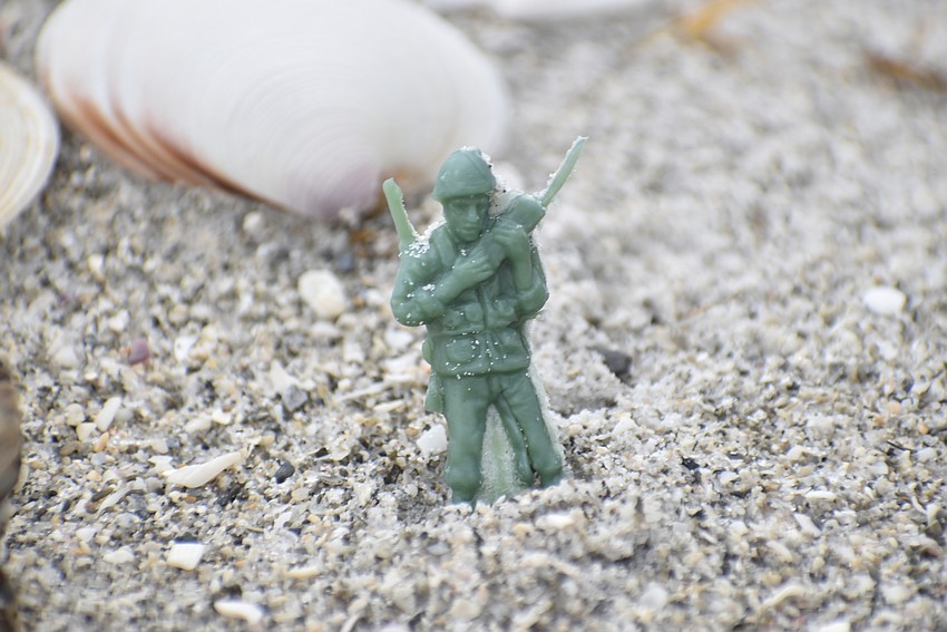 A toy soldier guards a spiral.