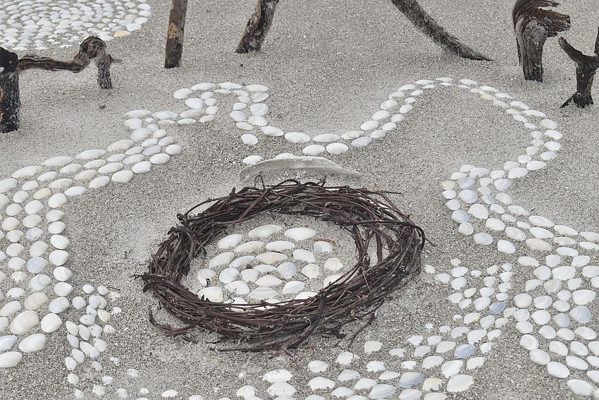 Dreyfus found a wreath on the beach one day and incorporated it.