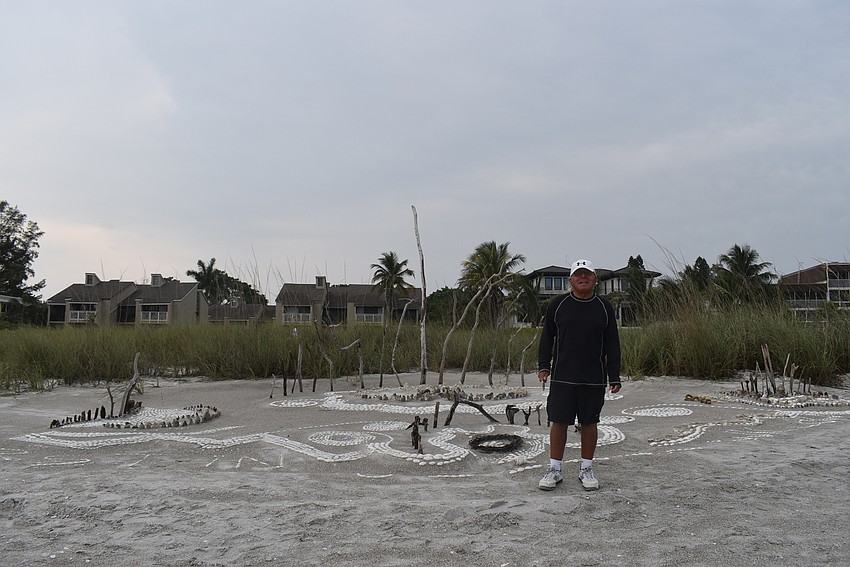 Dreyfus and his artwork.