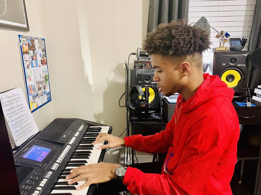 Brandon Wilson enjoys playing piano because he can play chords and different octaves and can perform solos better than on saxophone. Courtesy photo.