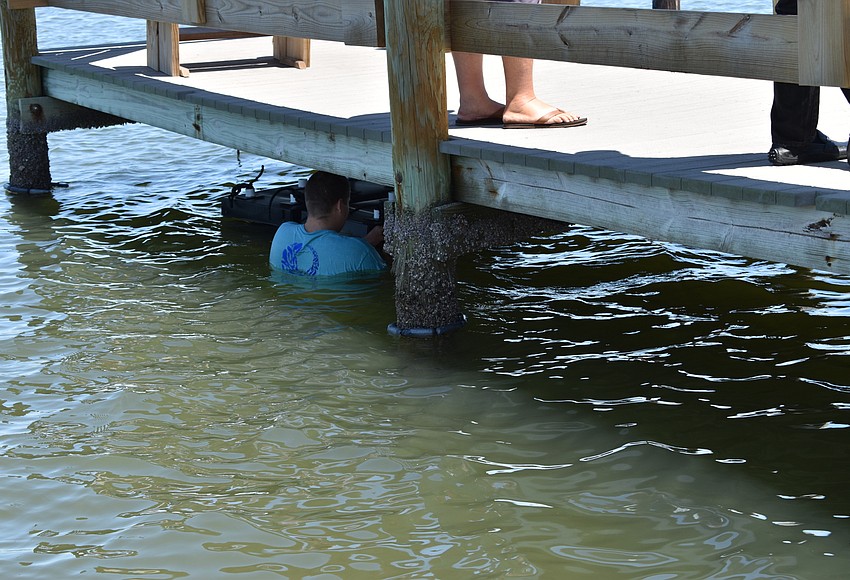 Your Observer Photo David Wolff Jr. installs two Mini Reefs