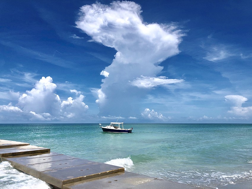 Matthew Morris photographed this boat, anchored correctly, off the beach near the Colony Beach and Tennis Resort property.