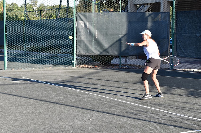 Kate Rhodes prepares to hit a tennis ball on Friday at the Longboat Key Tennis Center.