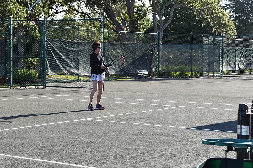 Fran Van Zandt is pictured playing tennis Friday morning at the Longboat Key Tennis Center. She said she plans to play again next week.