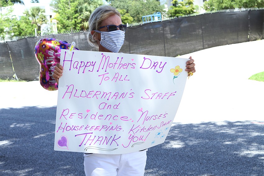 Lotte Winer welcomed cars into the parade.