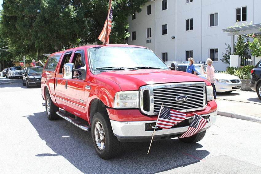 The parade had several cars honking for moms.