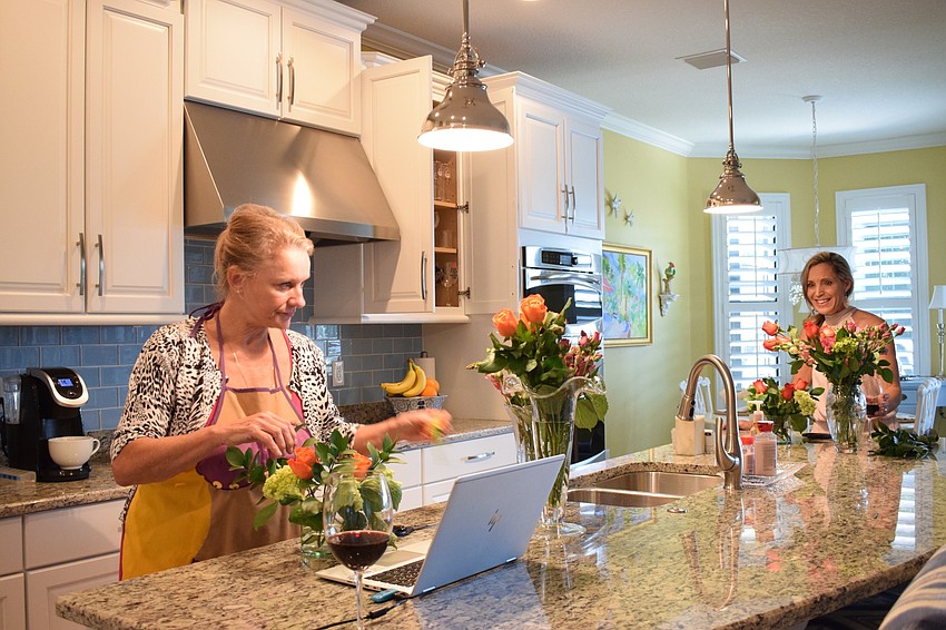 Robert E. Willis Elementary School fifth grade teachers Jacquie McLaurin and Suzanne Tomlin take a flower arrangement class virtually as part of Teacher and Staff Appreciation Week.